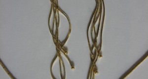 Set modern, compus din cercei si colier, din aur de 14 k