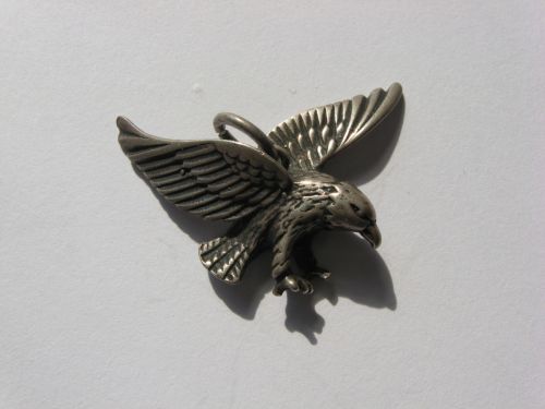 Medalion din argint (vultur), marcat.