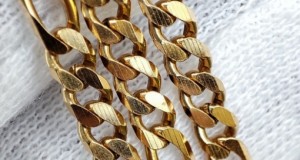 Lantisor lant aur 14k retro Figaro zale pline cu cruciulita cruce aur 16.18g.